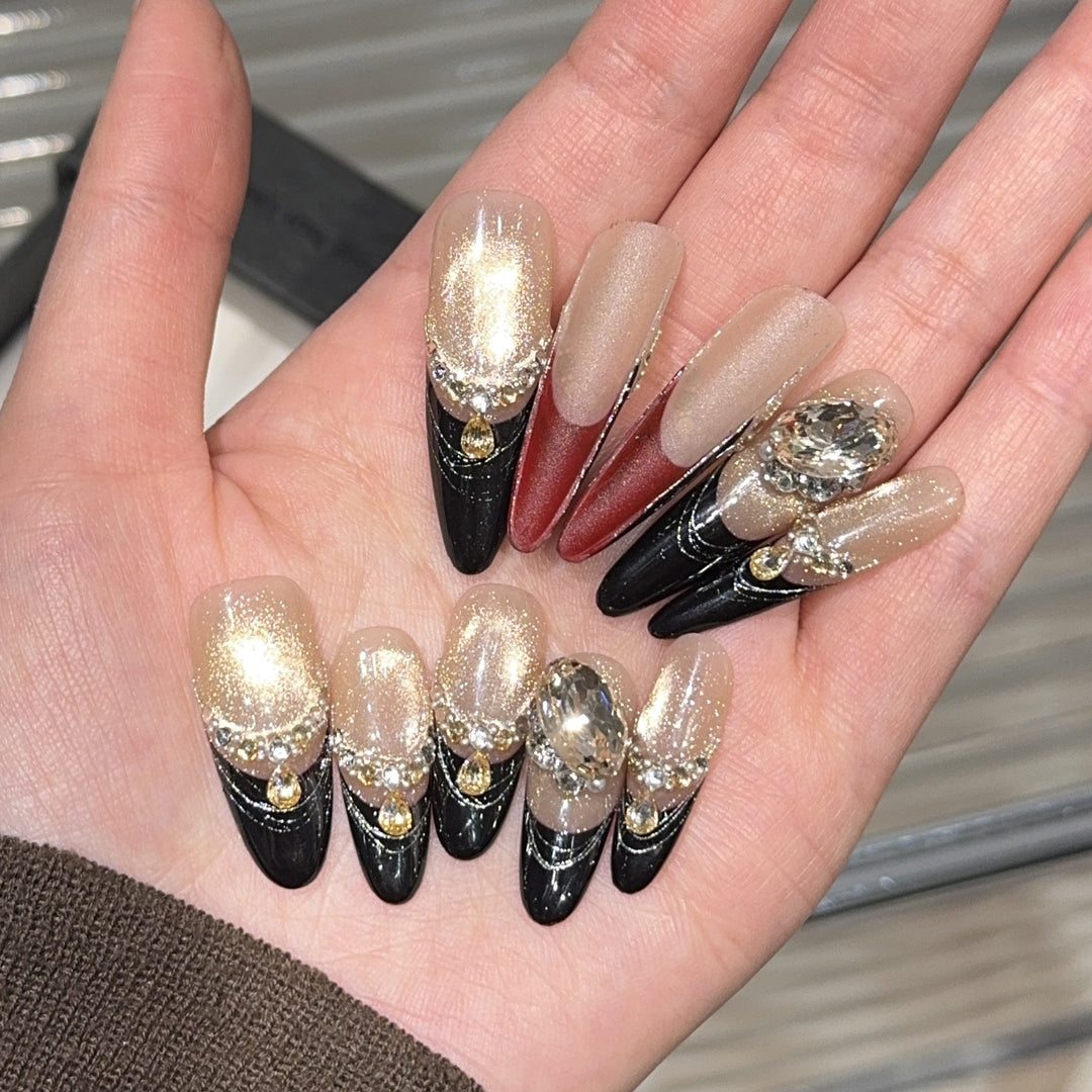 Glamorous artificial nails with extravagant rhinestone and glitter insets Bowlift