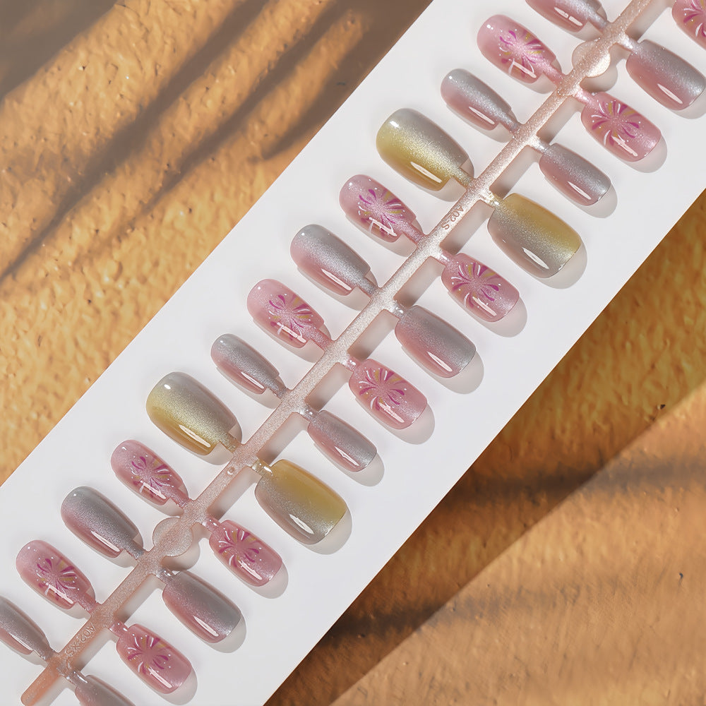 Artificial nails in modern ombre design with floral accents Bowlift