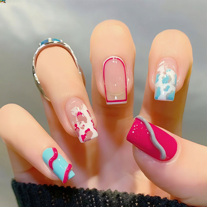 Artificial nails with modern wave pattern and heart accents Bowlift