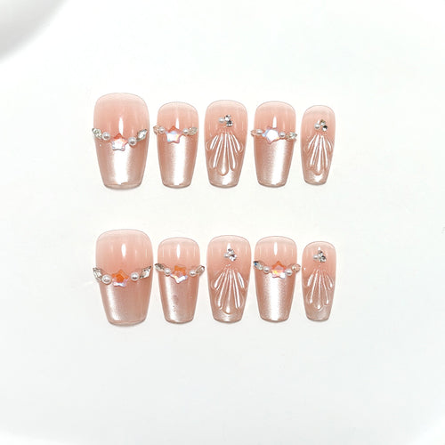 Exquisite artificial nails with glitter and pearl accents Bowlift