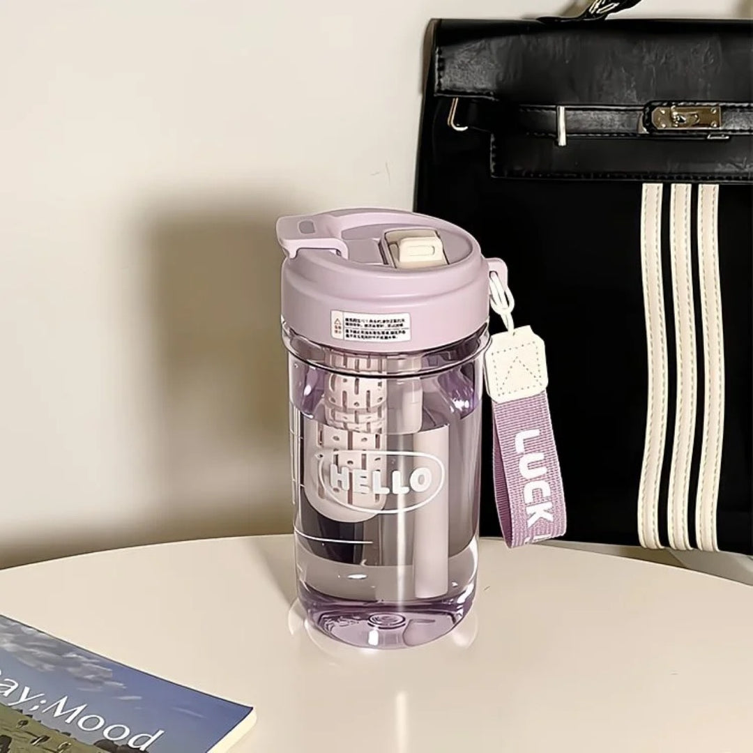 Ladies stylish drinking bottle with integrated carrying system Bowlift