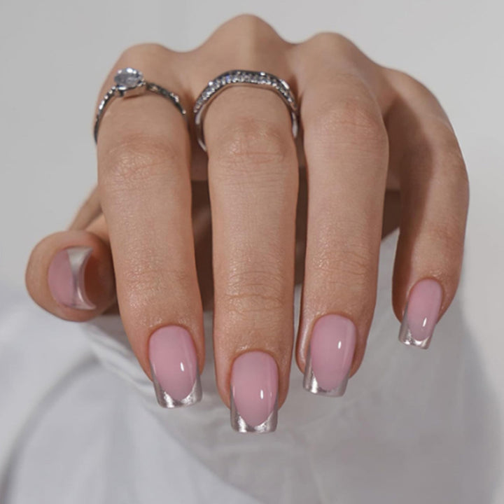 Artificial Nails in Natural French Tip Design Bowlift