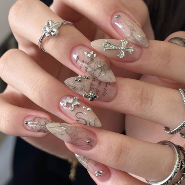 Glamorous stiletto nails with elegant star design Bowlift