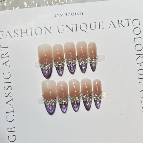 Elegant Stiletto Press-On Nail Set with Gemstone Embellishments Bowlift