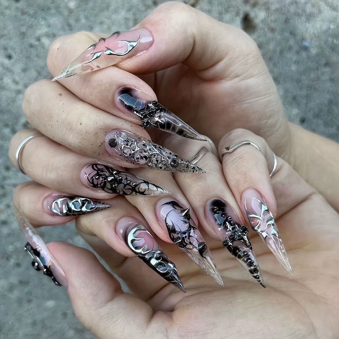 Artistic Stiletto Nail Extensions with Black Detailing Bowlift