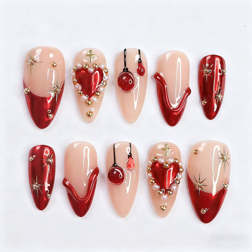 Elegant artificial nails with romantic gold and pearl embellishments Bowlift