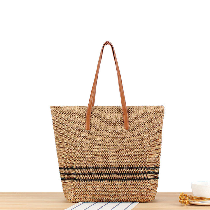 Stylish beach bag made of natural weave with leather handles Bowlift