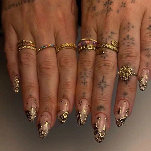 Trendy artificial nail tips with luxurious gold accents Bowlift