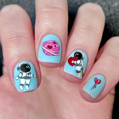 Creative Astronaut-Themed Press-On Nail Art Bowlift