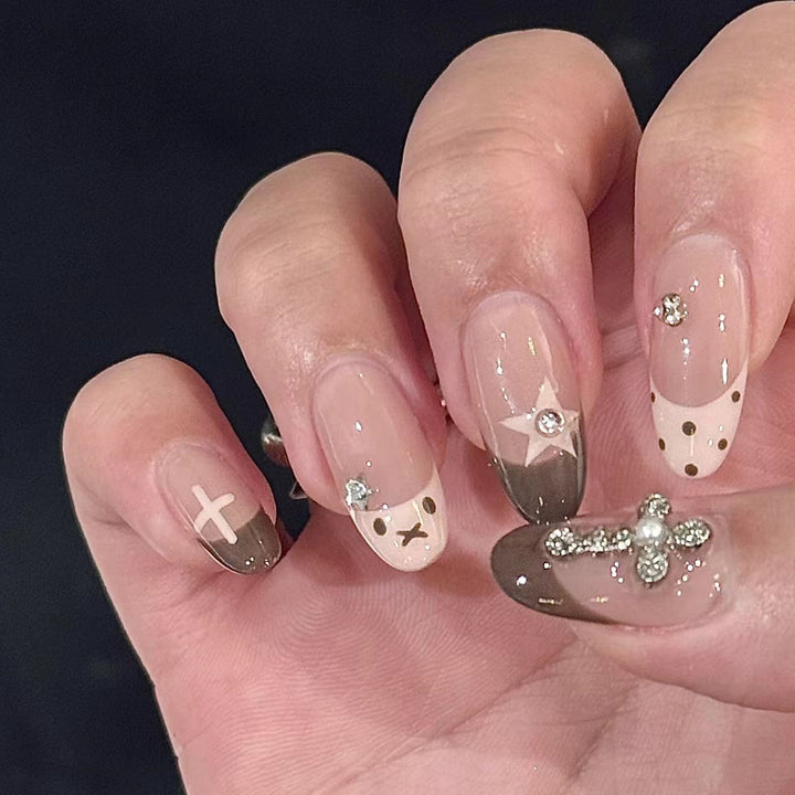 Artistic Press-On Nail Set with Bow and Gemstone Detail Bowlift