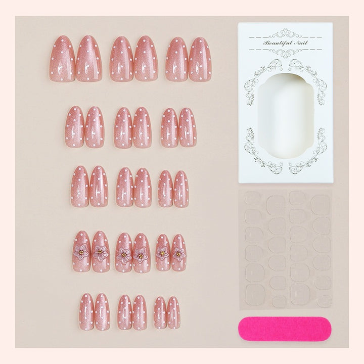 Artificial nail set with glitter and delicate floral and rhinestone embellishments Bowlift