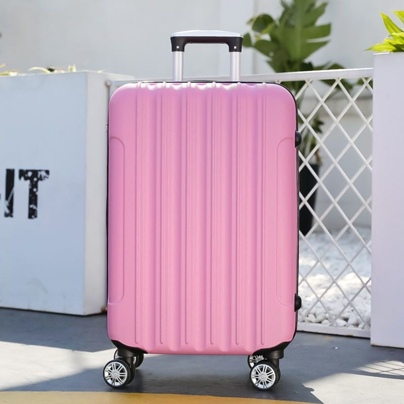 Hard shell suitcase with 360-degree wheel system and integrated safety feature Bowlift