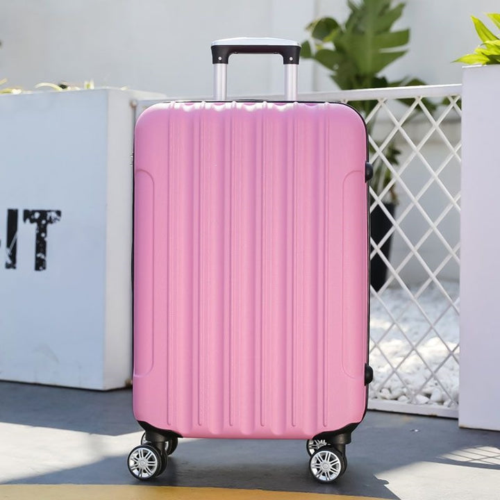 Hard shell suitcase with 360-degree wheel system and integrated safety feature Bowlift