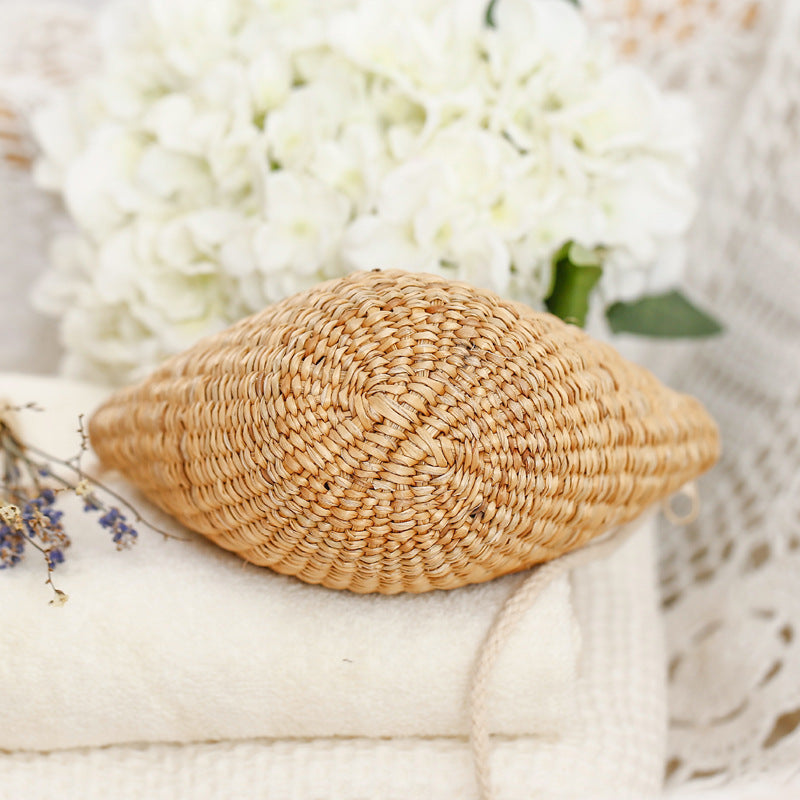 Handcrafted basket bag in unique half-moon design Bowlift