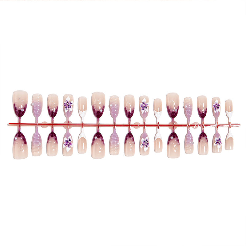 Artificial nails with elegant ombre effects and floral accents Bowlift