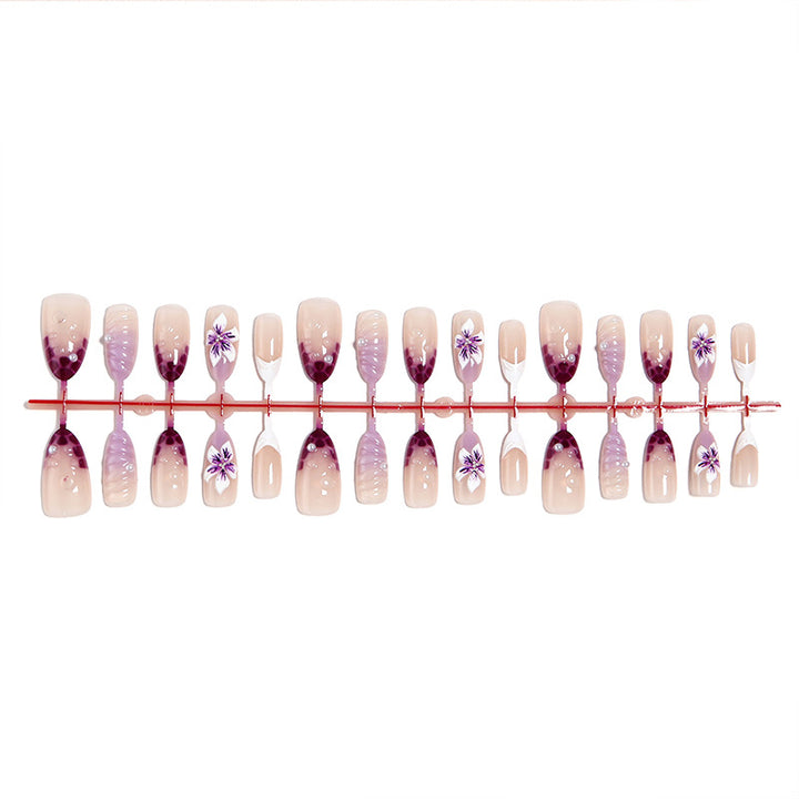Artificial nails with elegant ombre effects and floral accents Bowlift