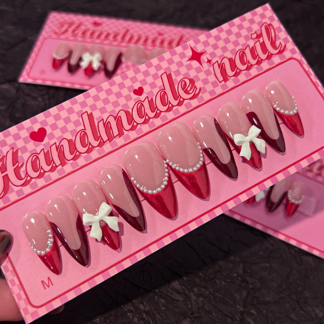 Artificial acrylic nails with detailed floral accents Bowlift