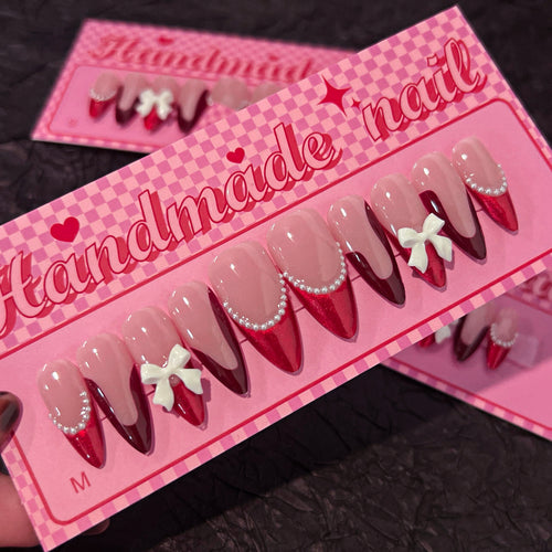 Artificial acrylic nails with detailed floral accents Bowlift