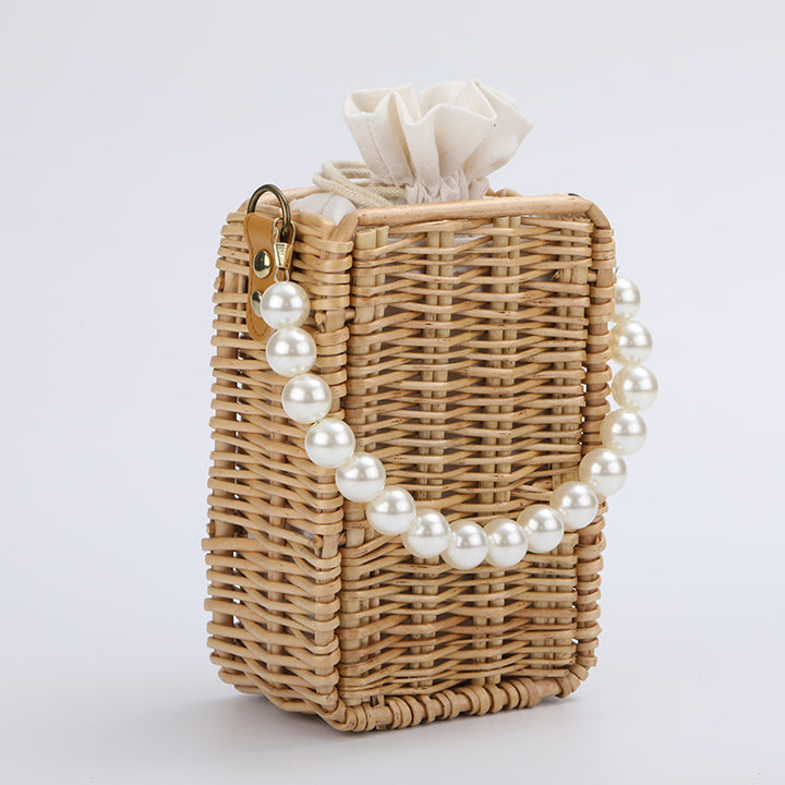 Women's handbag made of woven material with pearl accents Bowlift