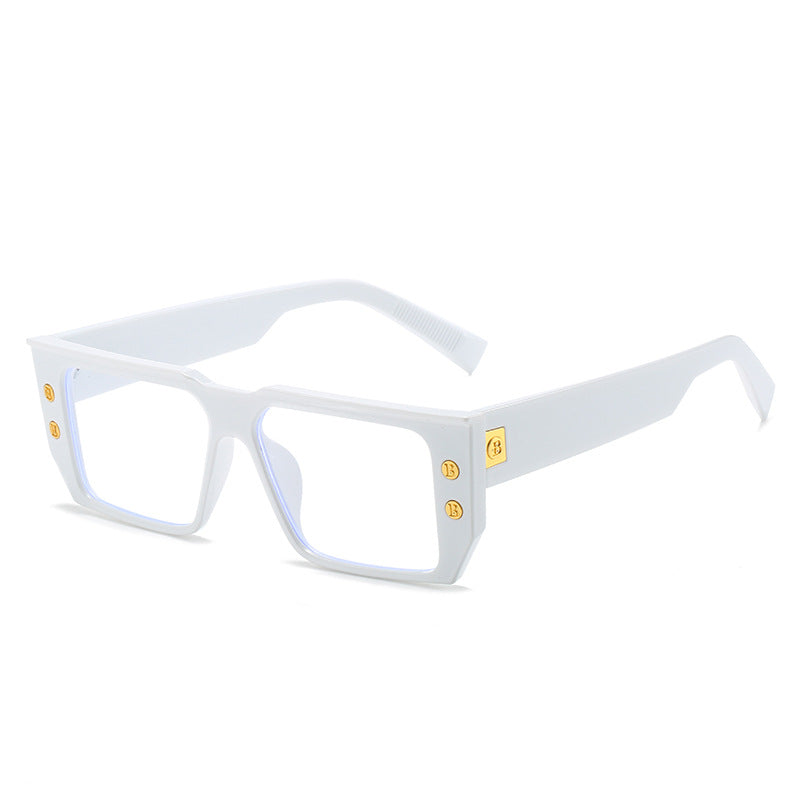 Women's fashionable clear glasses with golden accents Bowlift