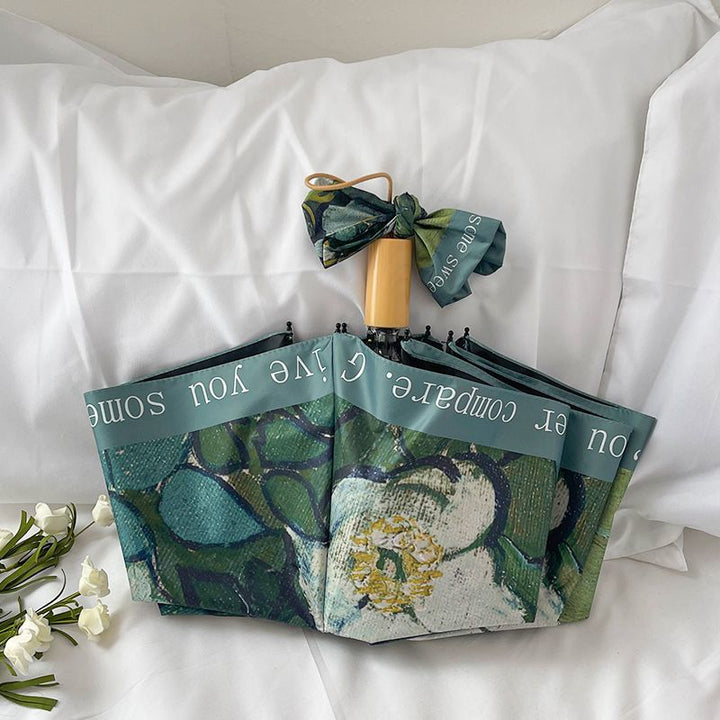Women's Folding Umbrella with Floral Accents Bowlift
