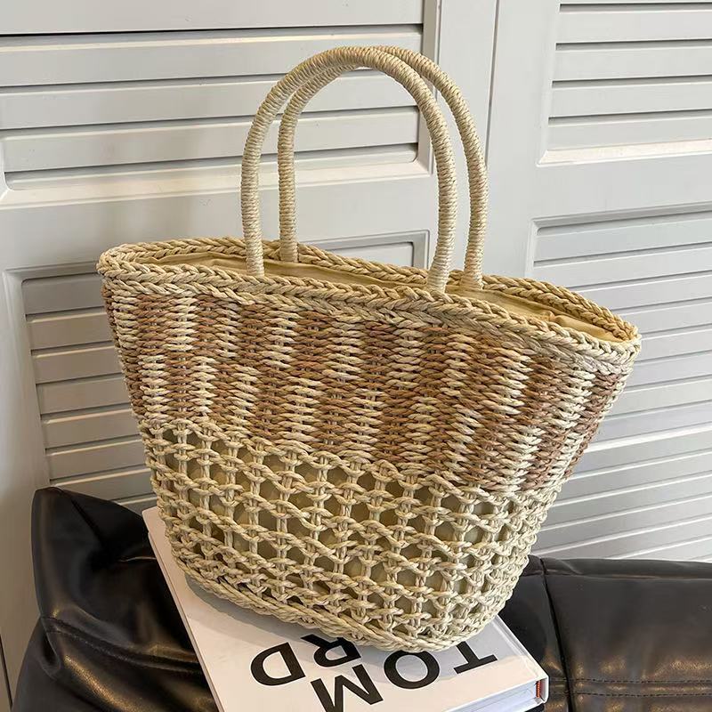 Handwoven basket bag with airy structure Bowlift