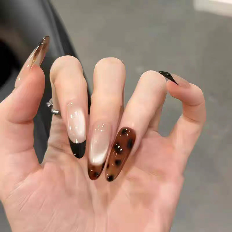 Artificial nails with elegant ombre design and delicate accents Bowlift
