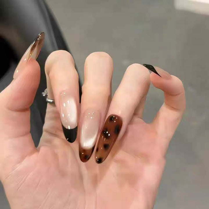 Artificial nails with elegant ombre effect and delicate rhinestone embellishments Bowlift
