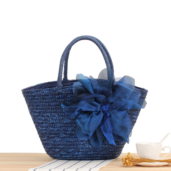 Elegant straw bag with floral accents Bowlift