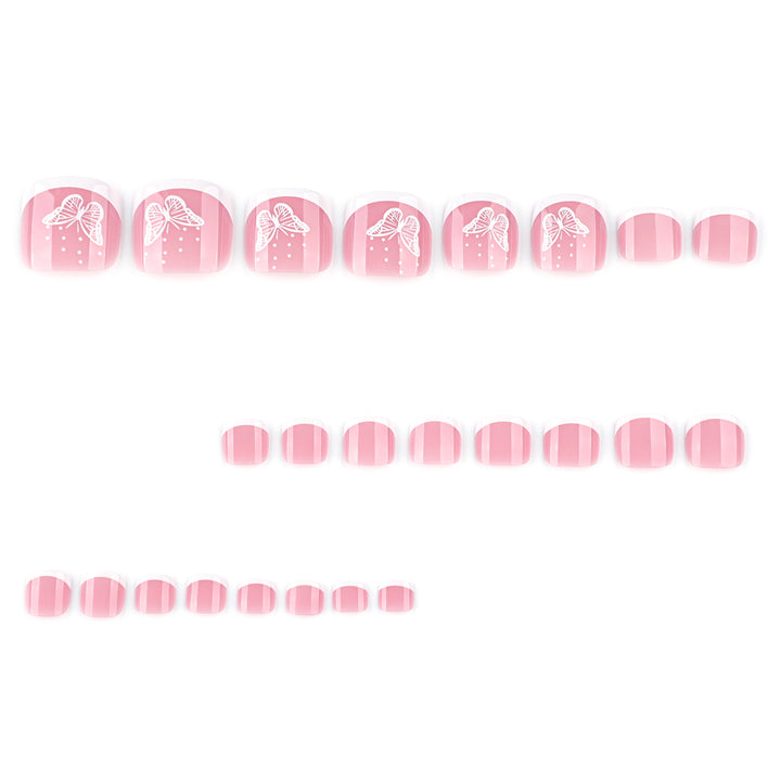 Artful toenail design with elegant butterfly motifs and French design Bowlift