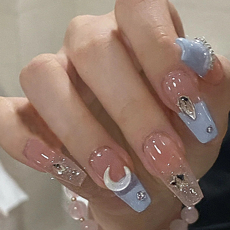Glamorous artificial nails with heart and glitter details Bowlift