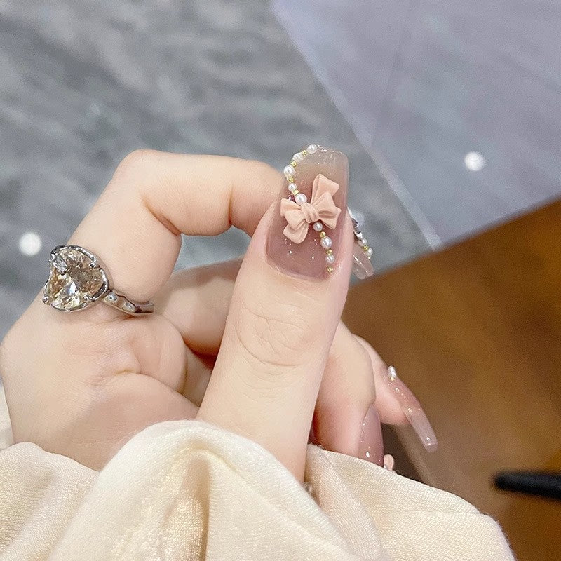Glamorous artificial nails with moon and star motif Bowlift