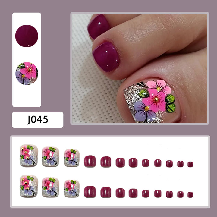 Artificial nails with floral designs and glitter effects Bowlift