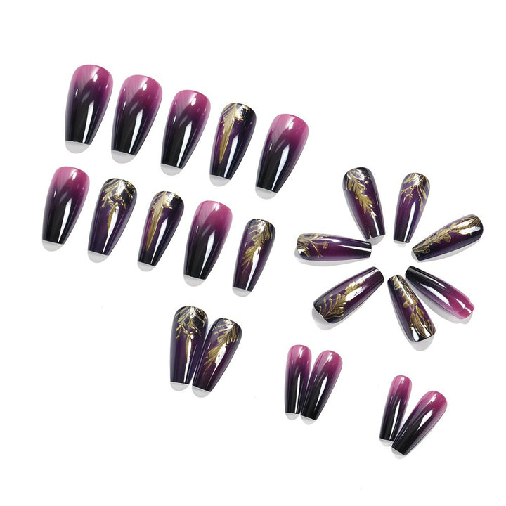 Artificial nails in elegant ombré design with gold accents Bowlift