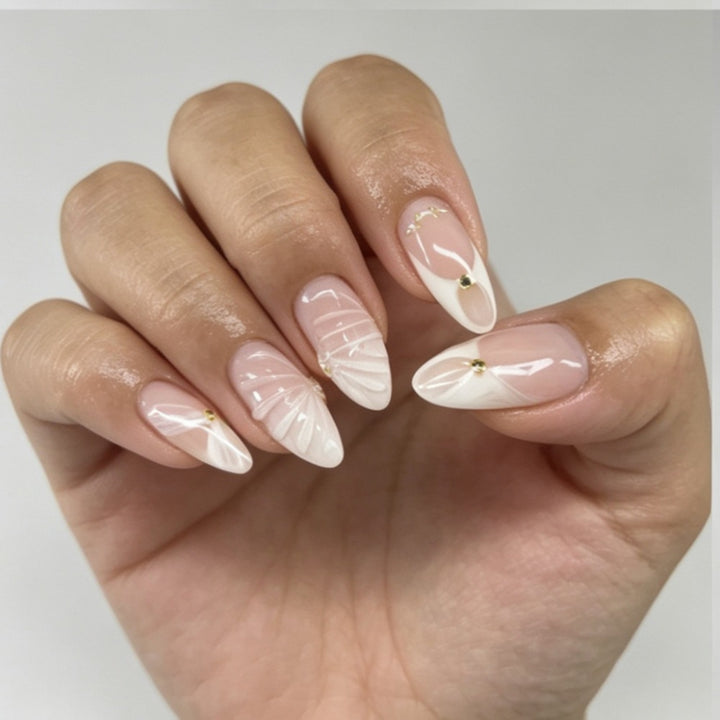 Artificial nails with elegant flower design and glitter accents Bowlift