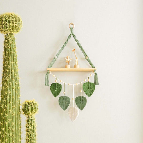Macramé plant shelf with artistic leaf design