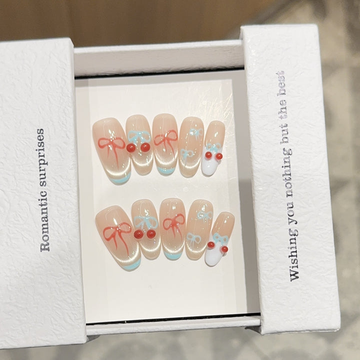 Artificial nail tips with romantic bow and cherry motifs Bowlift