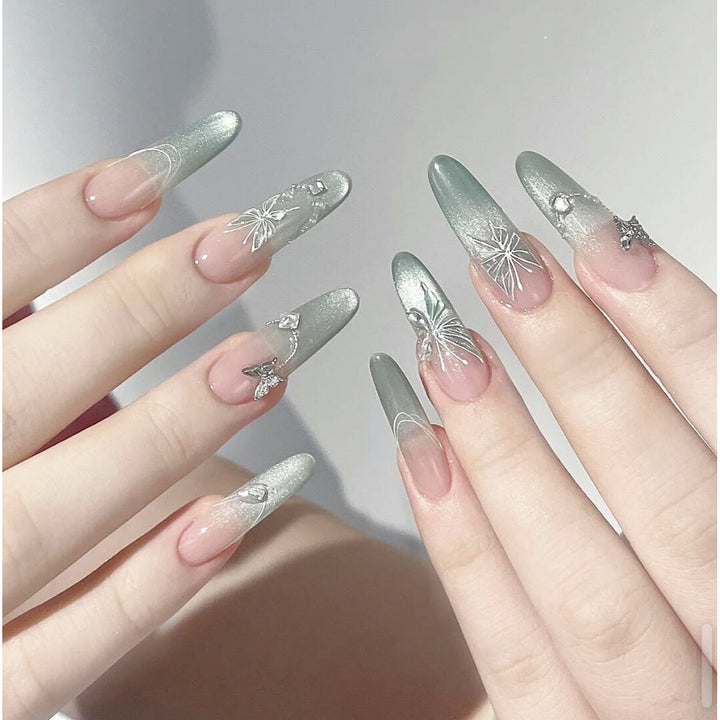 Decorative Stiletto Press-On Nail Set with Artistic Floral and Gemstone Accents Bowlift