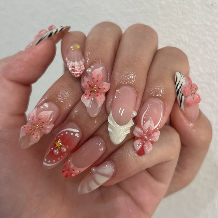 Artistic Nail Art with Floral and Elegant Accents Bowlift
