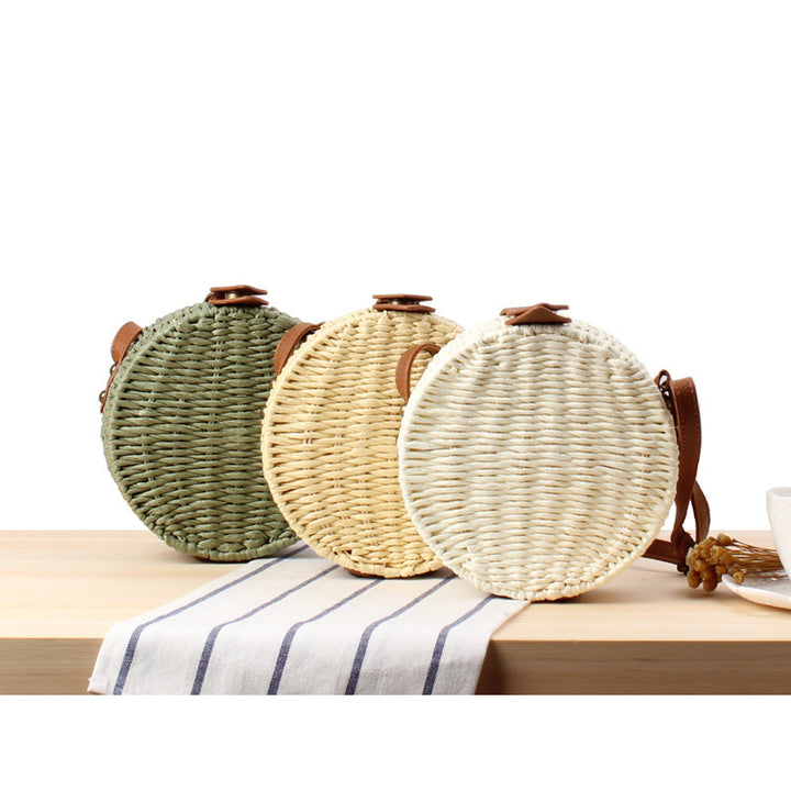 Round basket bag with leather accents Bowlift