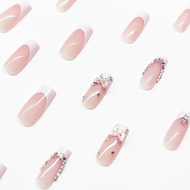 Acrylic nail set with elegant rhinestone and glitter decorations Bowlift