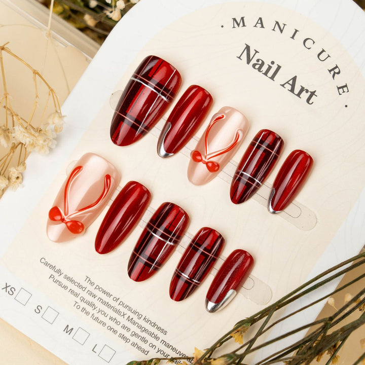 Art nail set with festive design and bow accents Bowlift