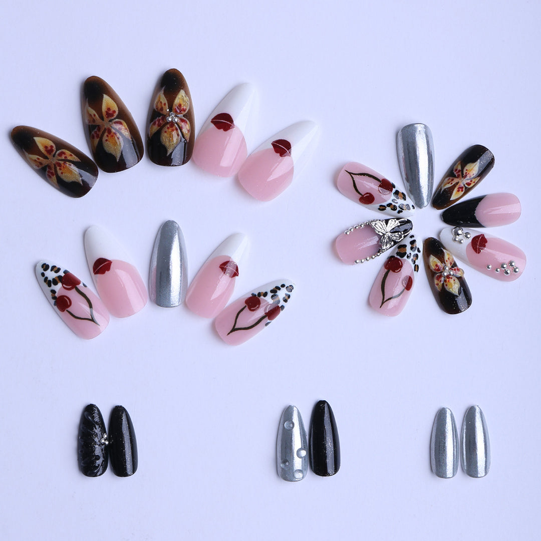 Artful Stiletto Fingernails with Unique Design Elements Bowlift