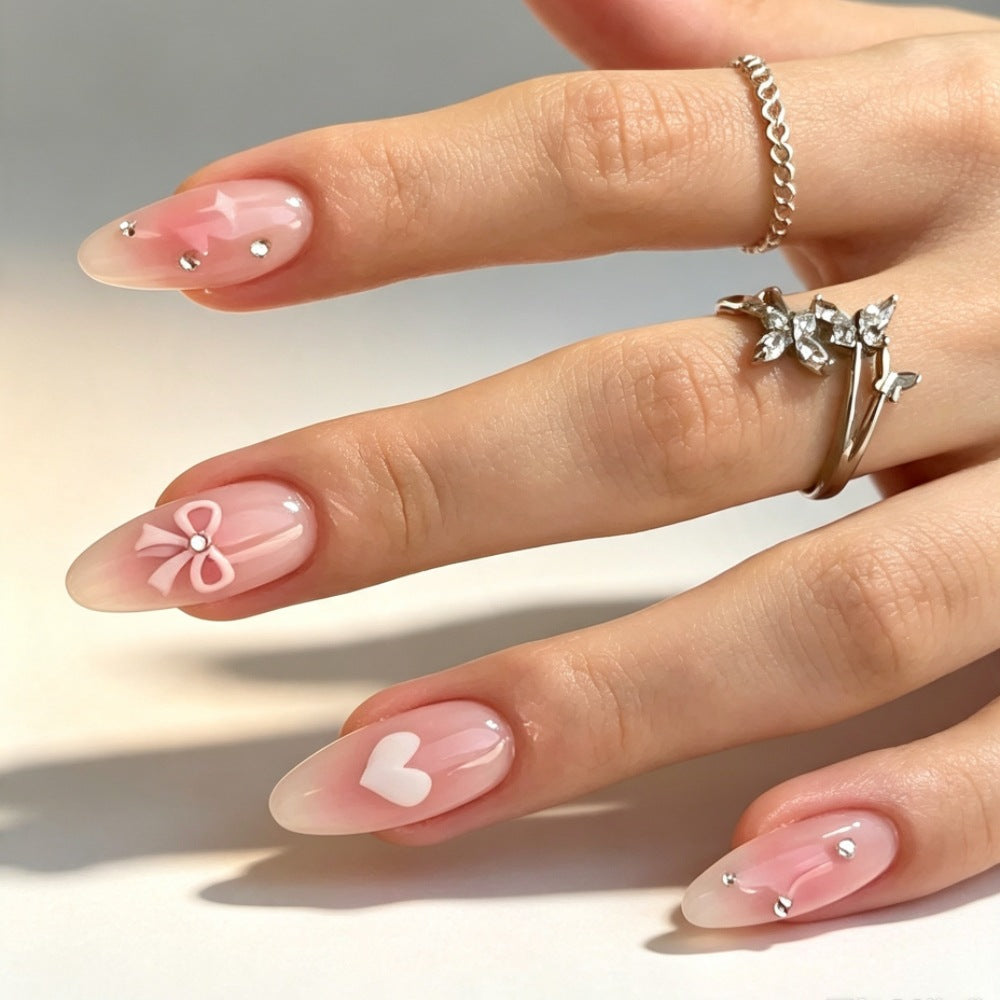 Artificial nails with romantic heart and bow design Bowlift