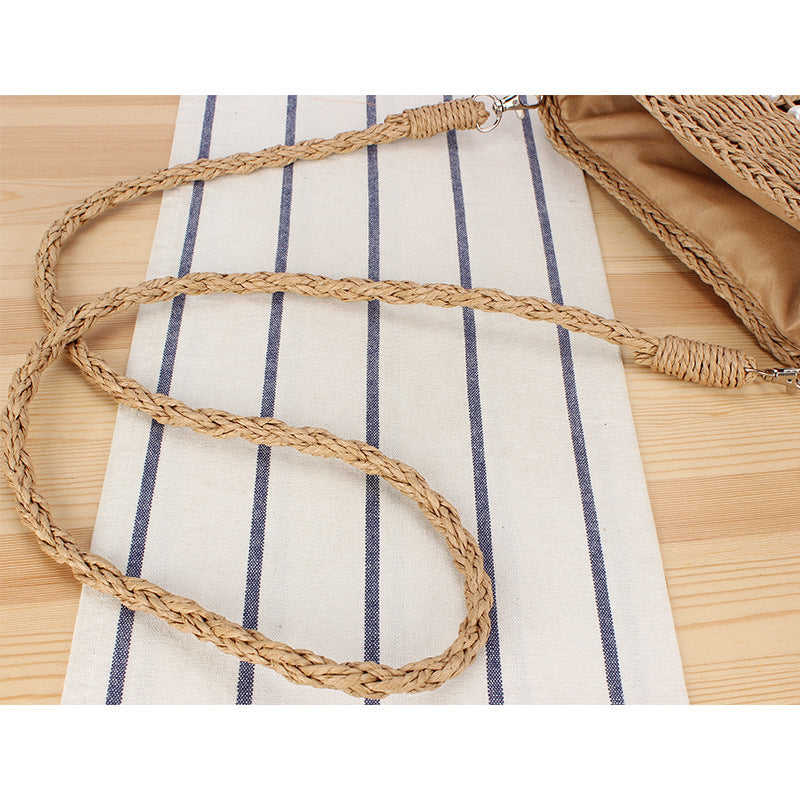 Handbag made of hand-woven natural material with pearl decoration Bowlift
