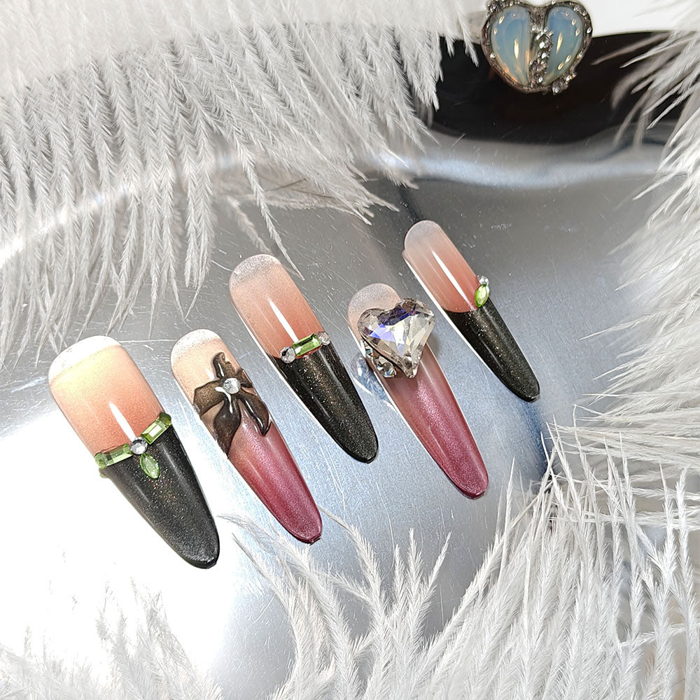 Artificial nails with elegant tip design and glitter accents Bowlift