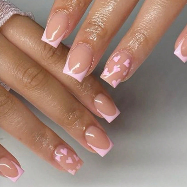 Art nail set with romantic heart designs and elegant French design Bowlift