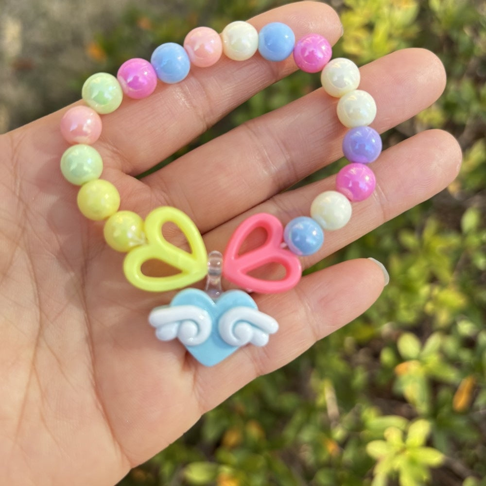 Colorful bracelet with flower charms Bowlift