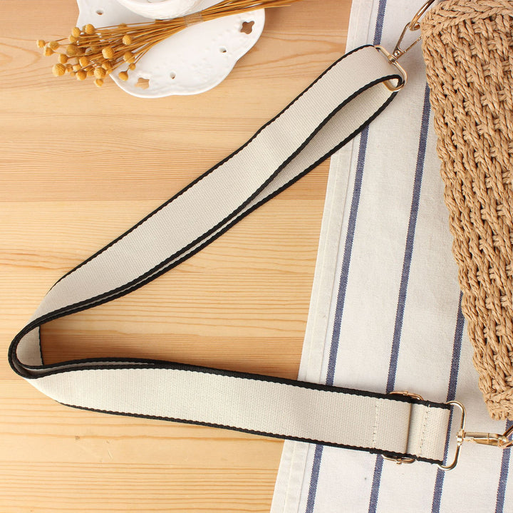 Handbag made of woven natural material with adjustable shoulder strap Bowlift