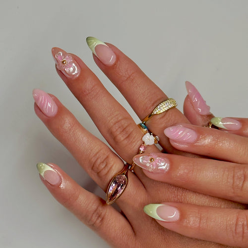 Artful Nail Extensions with Floral Design and Glamorous Accents Bowlift